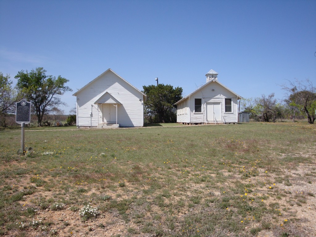 The school (left) and church (right) in Gunsight, Texas.